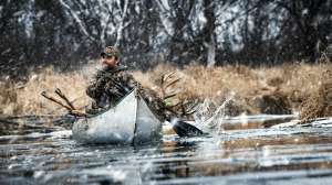 Buck in a canoe