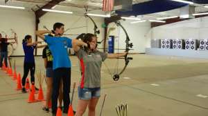 Kids shooting bows ISC system
